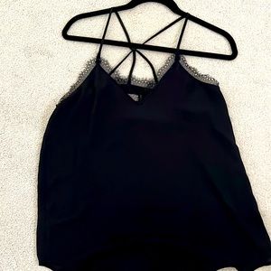Loft small black silky top with lace detail.